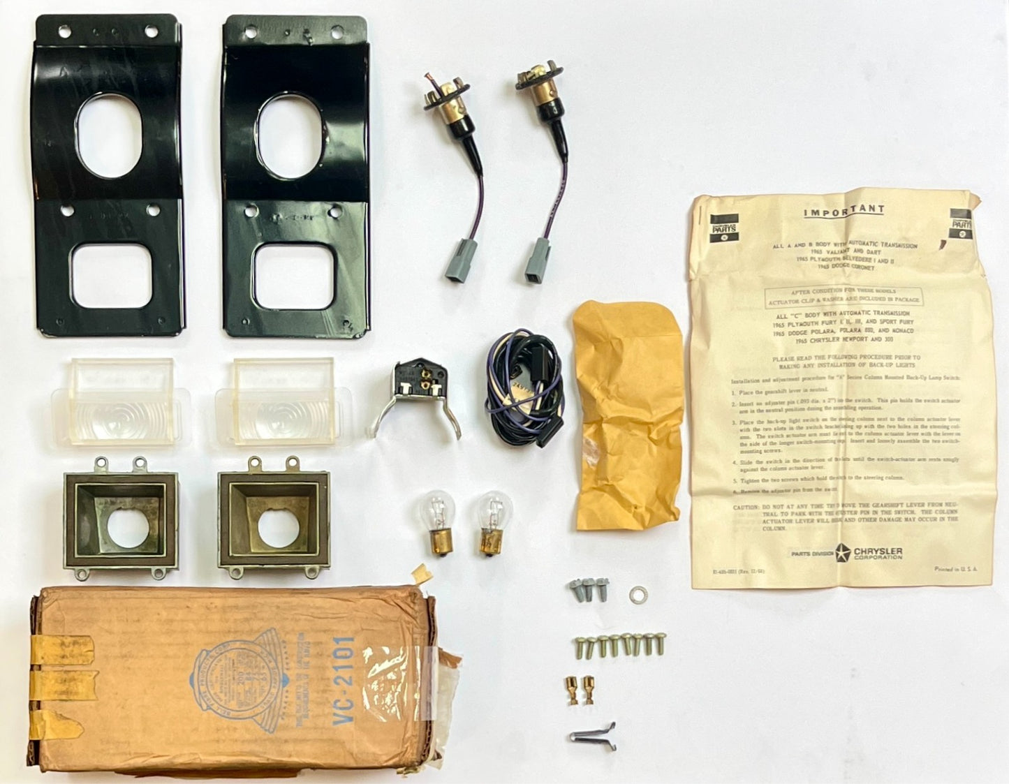 New Old Stock Reverse Lamp Light Pkg. for 1965 Dodge Models Mopar #2587610