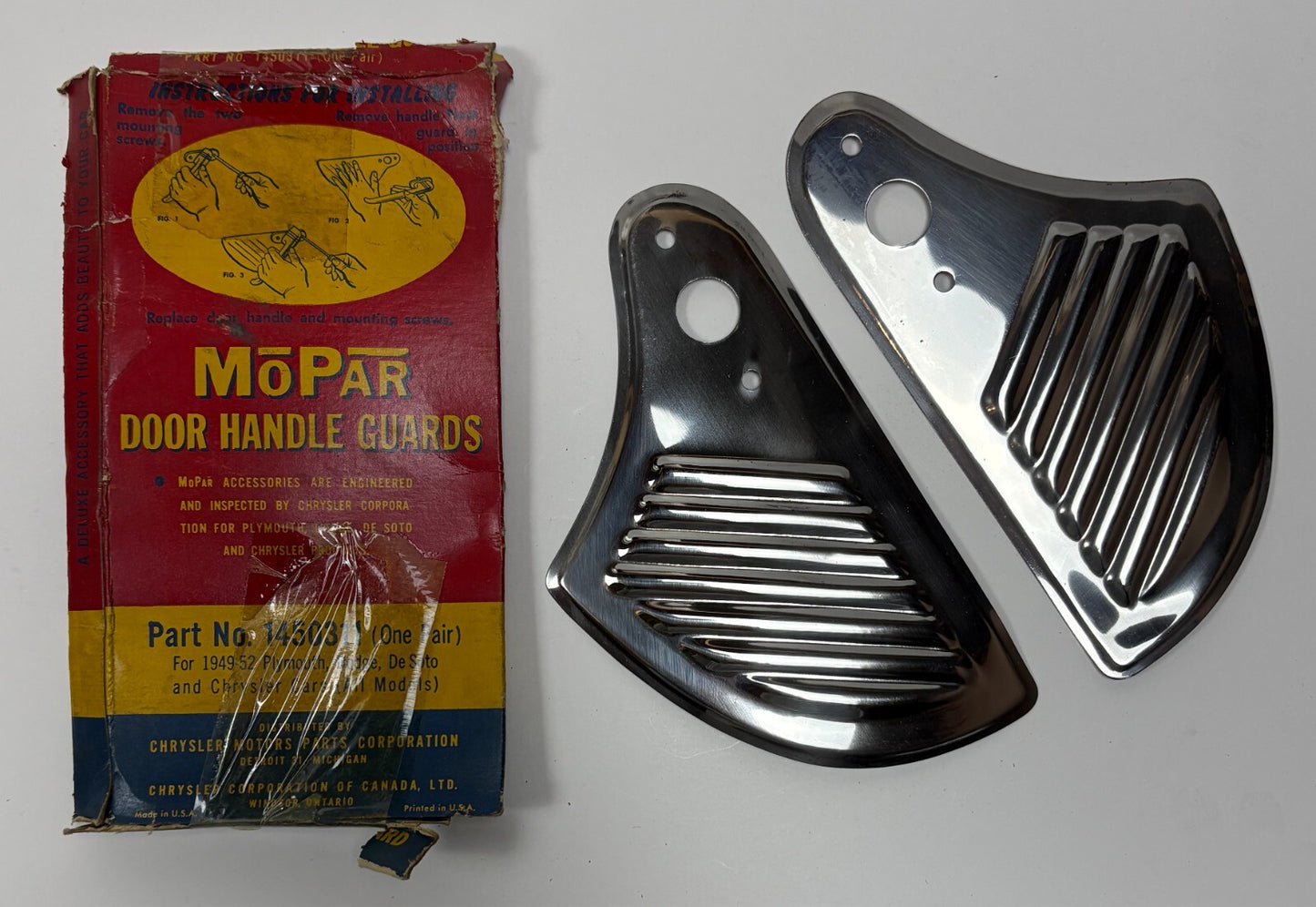 New Old Stock Door Handle Guards for 1949-52 All PDCD Models Mopar #1450311