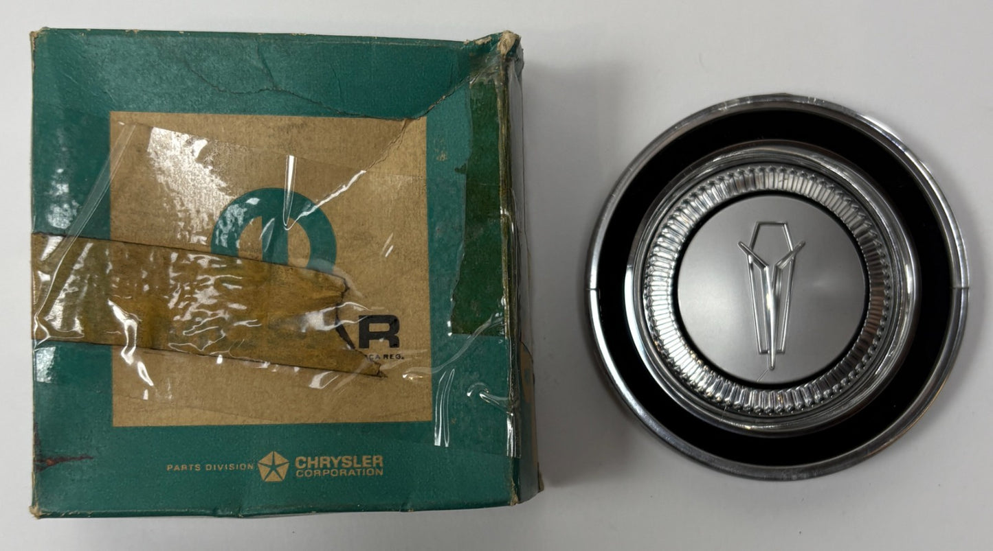 New Old Stock Horn Ornament for 1962-66 Plymouth Valiant Models Mopar #2768271