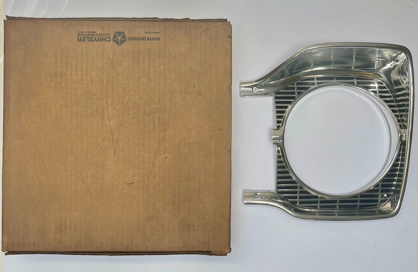 New Old Stock Left Headlight Bezel for 1965 Plymouth Models Mopar #2445241