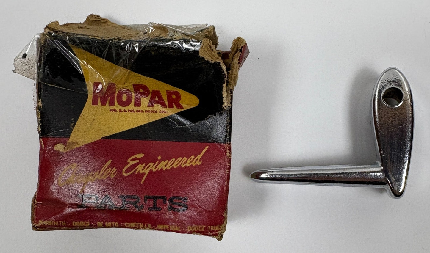 New Old Stock Left Vent Wing Handle for 1957-59 4 Door Models Mopar #1833675