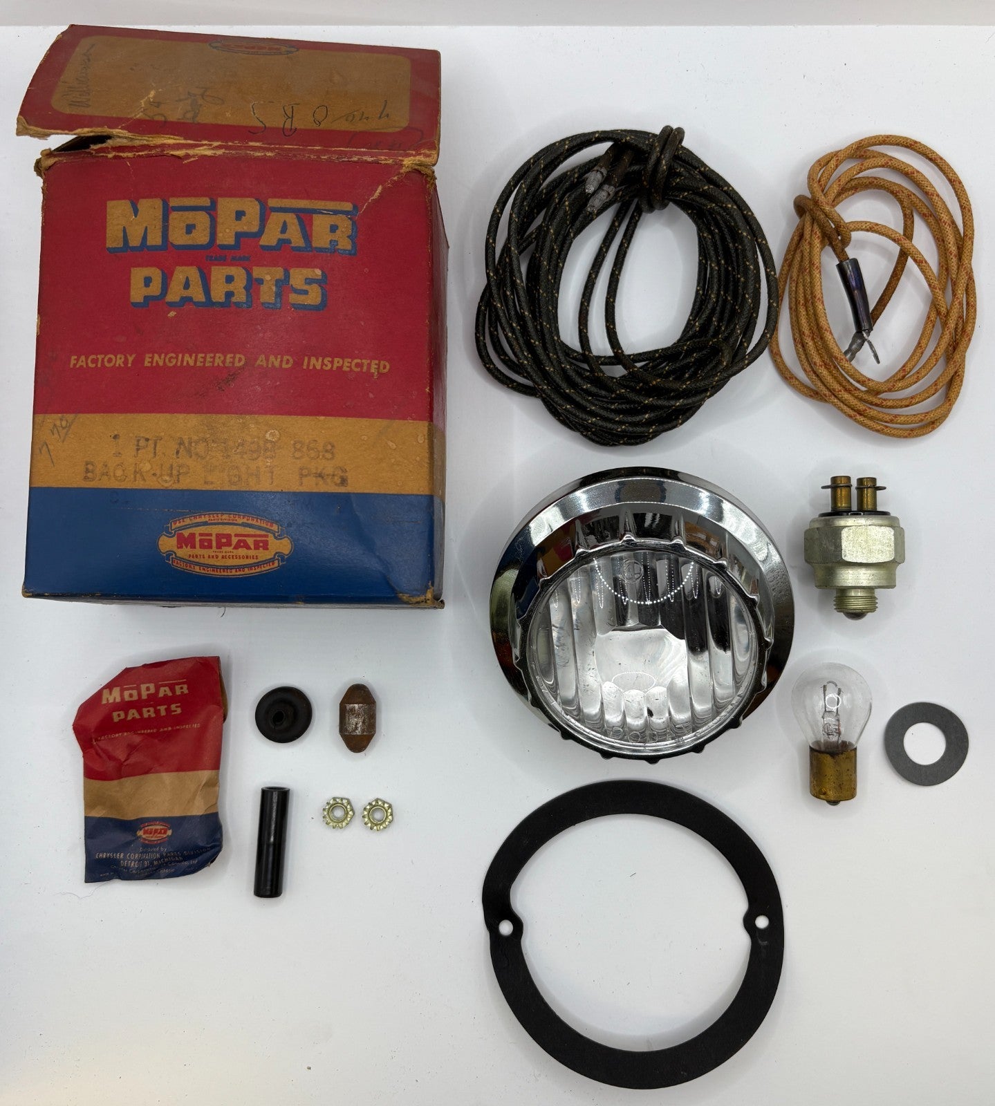 New Old Stock Back Up Light Lamp Package for 1953-54 Dodge Models #1498868