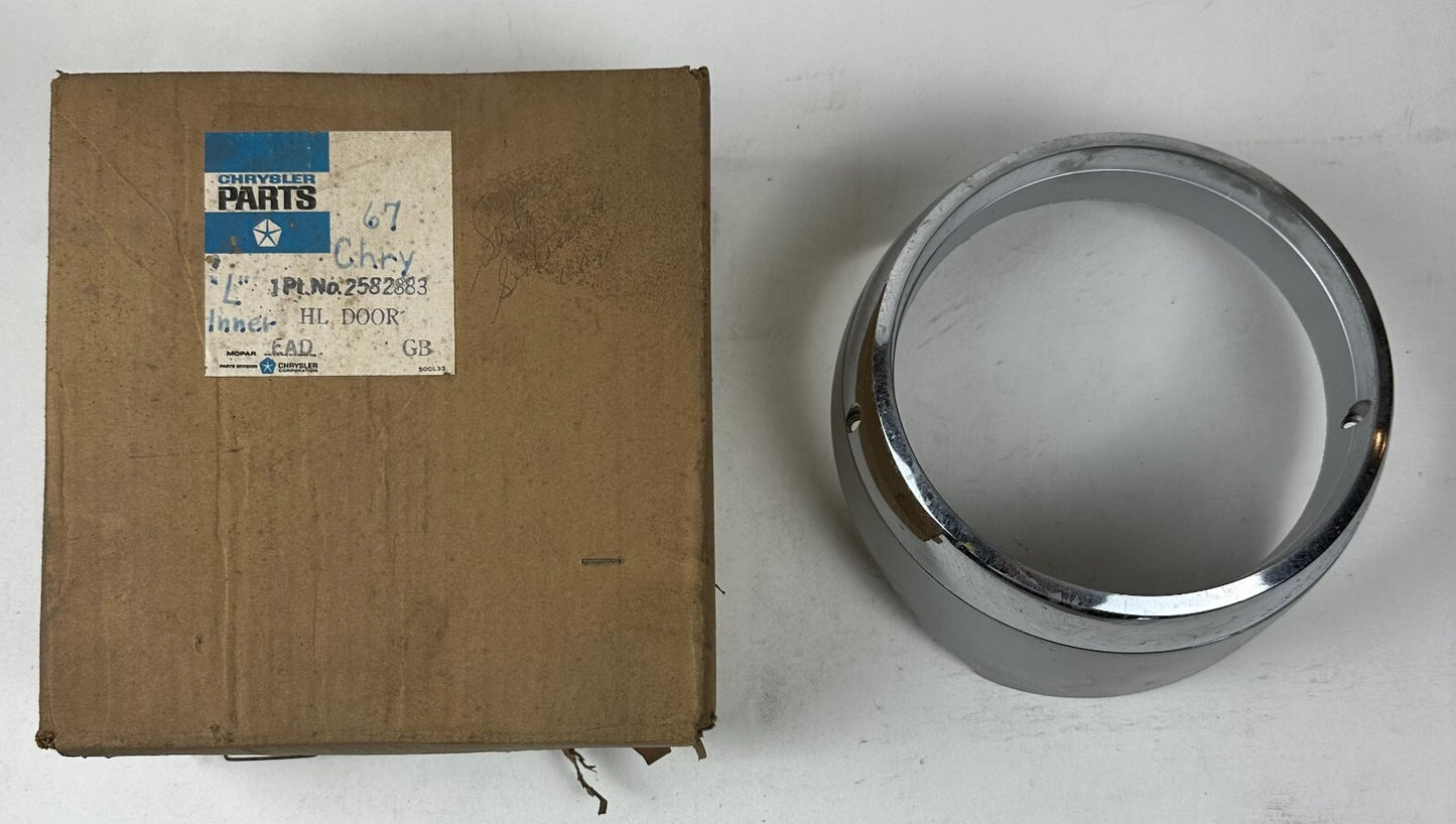 Mopar Inner Left Headlight Bezel 1967 Chrysler Newport NOS #2582883