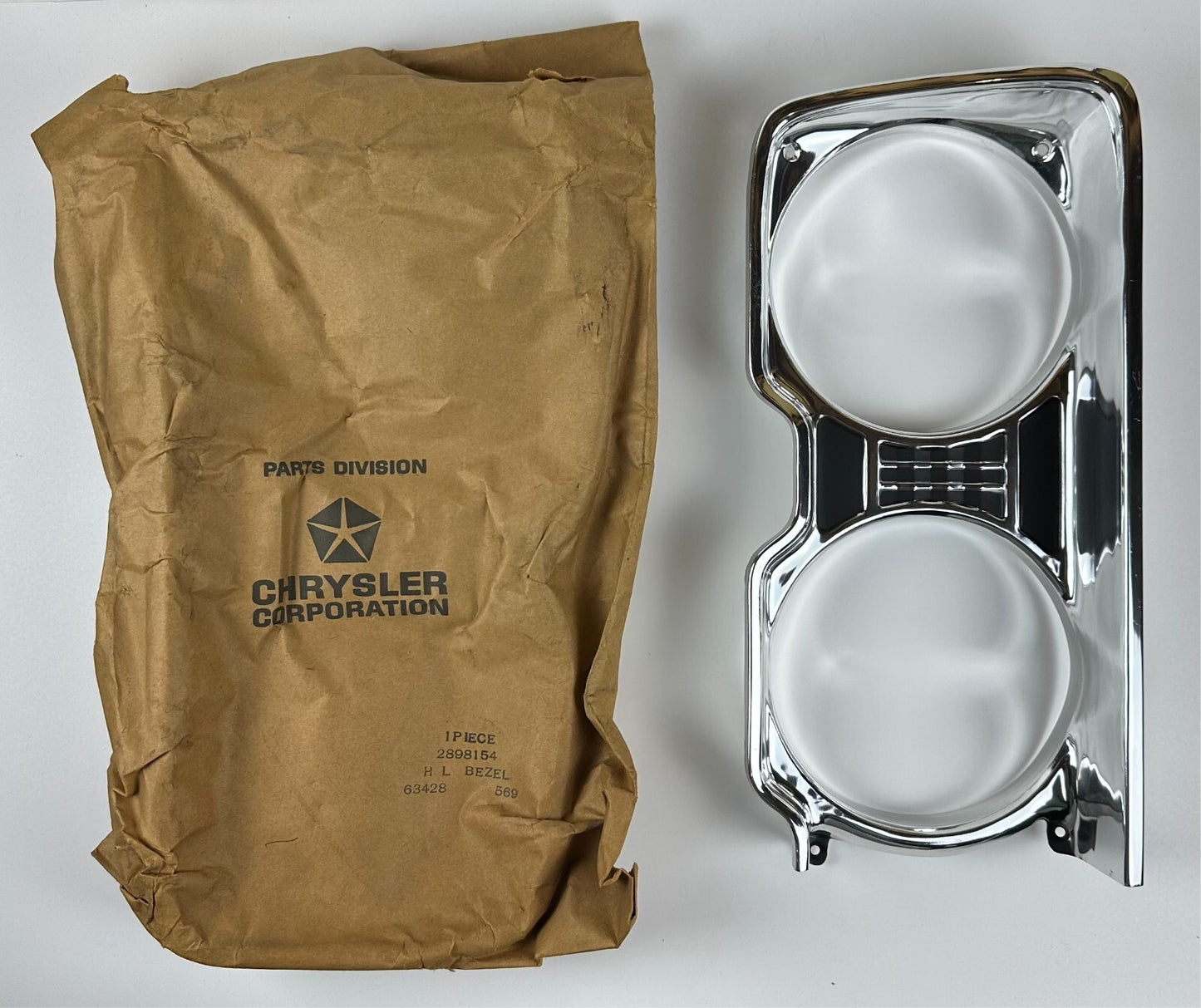 New Old Stock Right Headlight Bezel for 1969 Plymouth Models Mopar #2898154