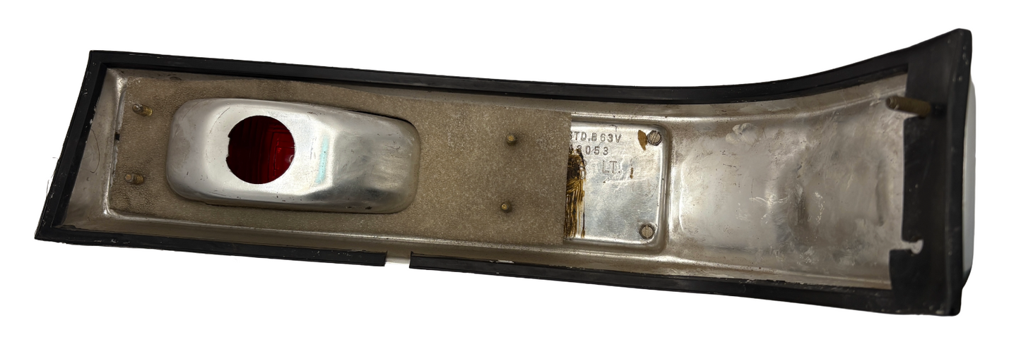 New Old Stock Left Tail Stop & Turn Signal Lamp Package 1963 Chrysler #2298894