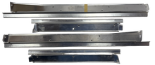 New Old Stock Rocker Panel Repair & Dressup Pkg for 1956-7 Chevrolet #2421428