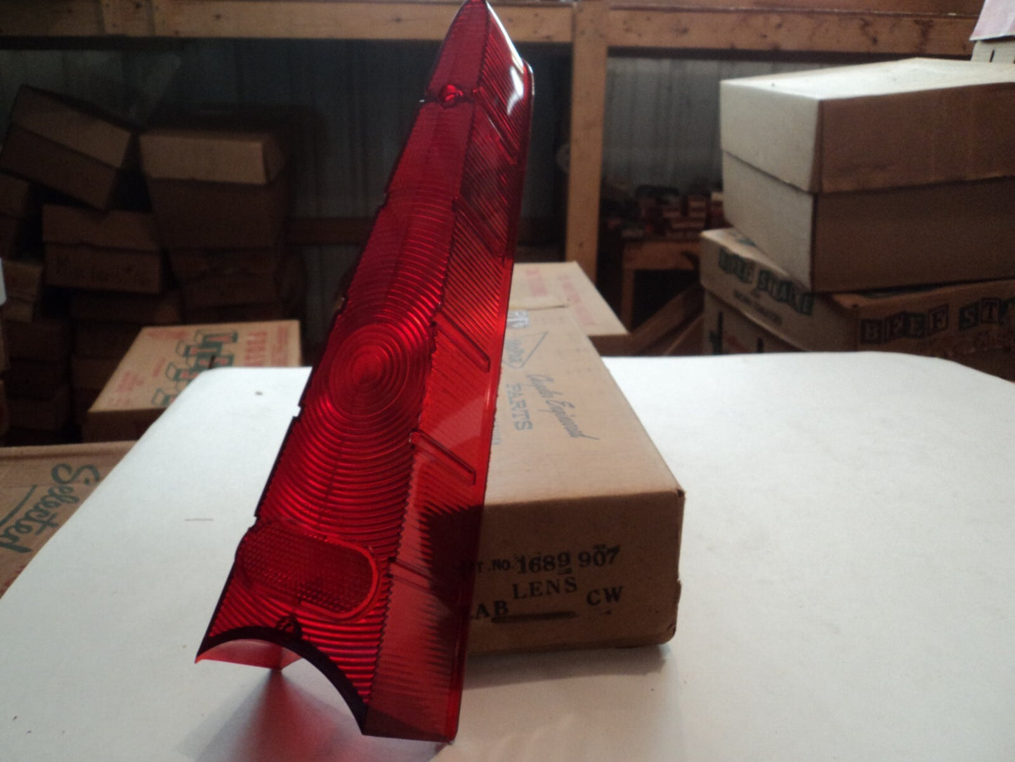 New Old Stock Tail lamp lens 1957 Plymouth part number 1689907