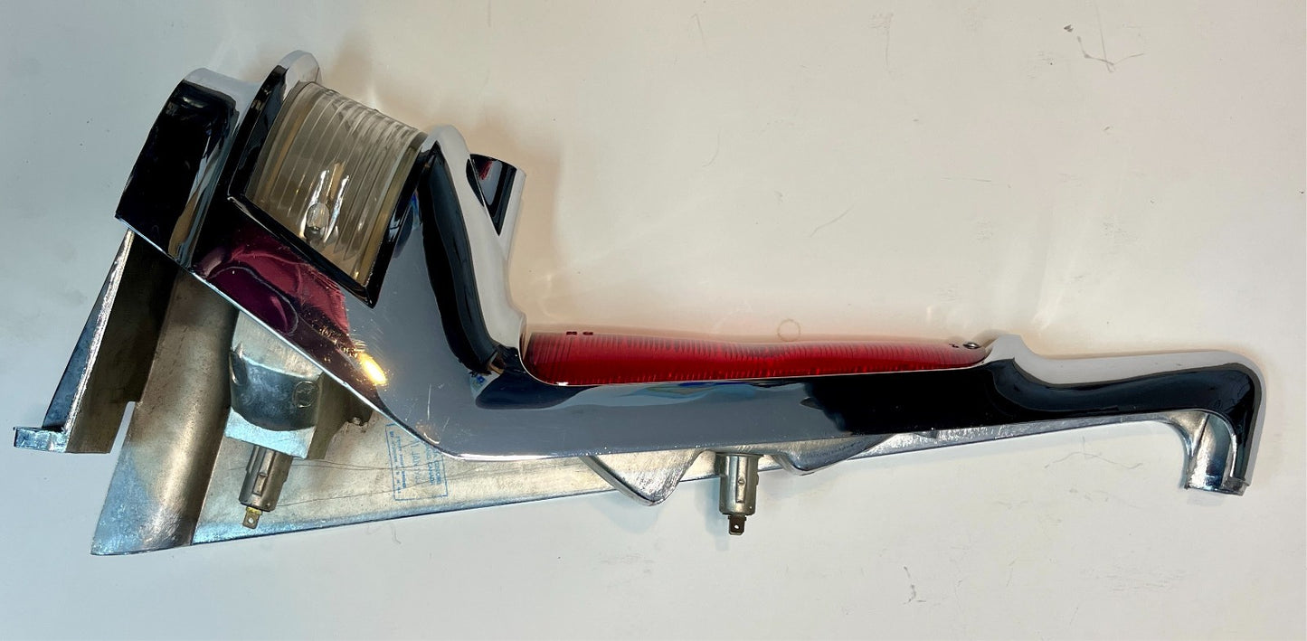 New Old Stock Left Taillamp Assy. Chrome bezel for 1960 Fury Wagons #1960886