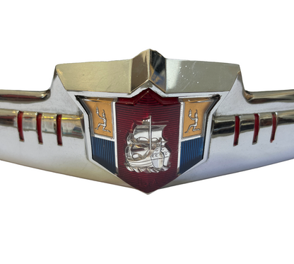 New Old Stock Hood Base & Medallion for 1949 Plymouth #1299361 & #1299362