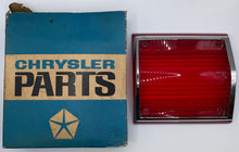 New Old Stock Tail Light Lens w/ Chrome Bezel for 1965 Plymouth Fury #2449696