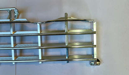 New Old Stock Bright Left Grille Assy. for 1959 Plymouth Models Mopar #1903631