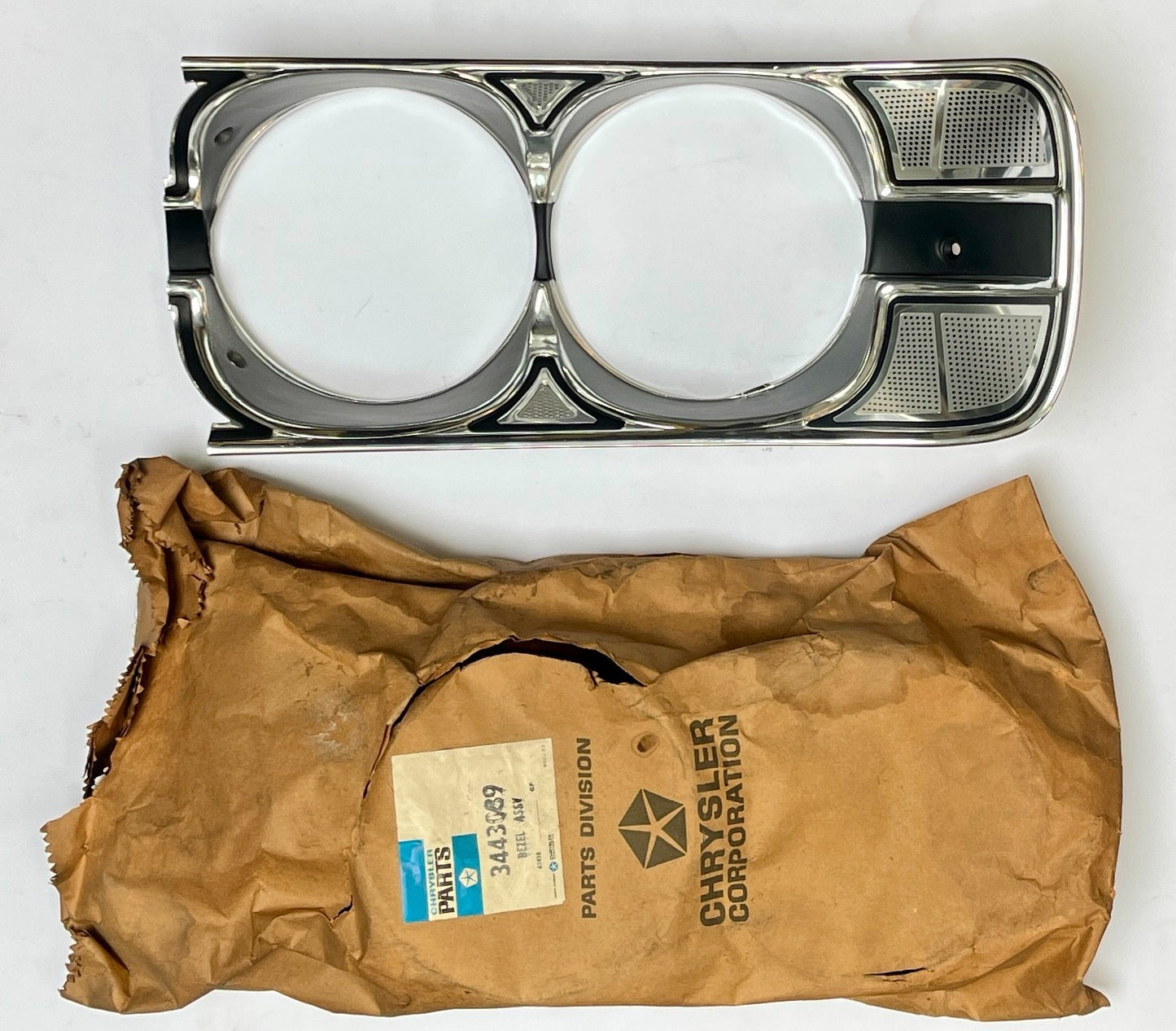 New Old Stock Left Headlight Bezel for 1971 Plymouth Fury I & II Models #3443089