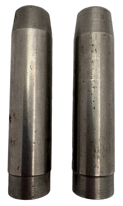 Two metallic cylindrical objects on a white background